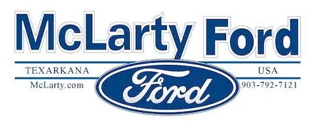McLarty Ford dealership logo with blue Ford oval and Texarkana location text