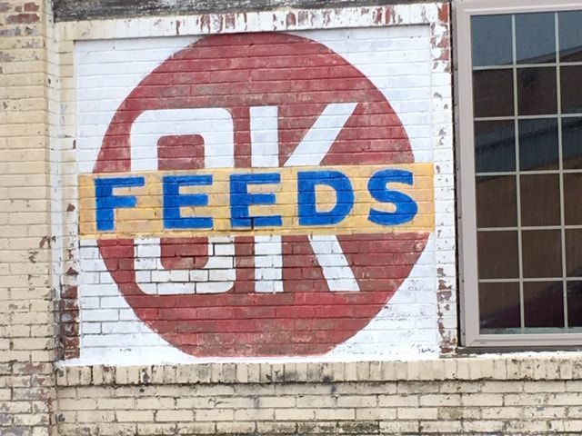 Painted brick sign for