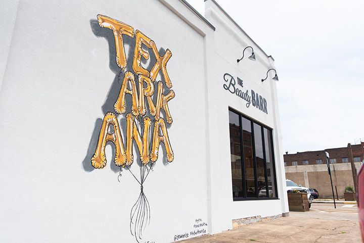 Mural on white building: