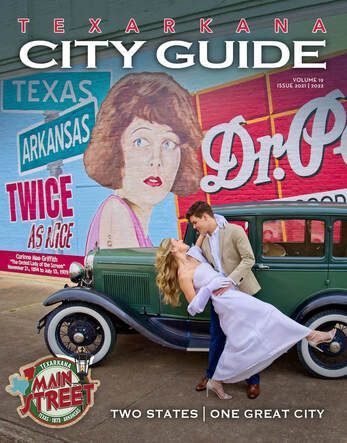 Texarkana city guide cover with couple dancing in front of vintage car and mural, 