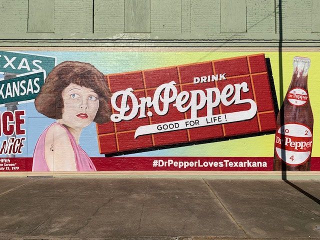 Mural of a woman and Dr. Pepper advertisement in Texarkana, Texas.