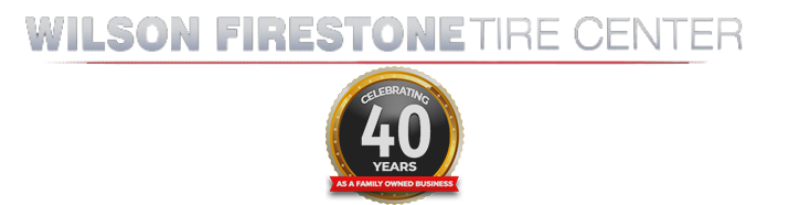 Wilson Firestone Tire Center logo with a 40 year anniversary badge.