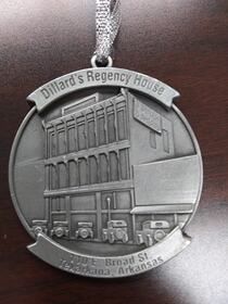 Silver Dillard's Regency House ornament, building facade detail,