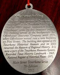 Medallion for the Offenhauser Building in Texarkana, Texas. Text details its history as a historic landmark.