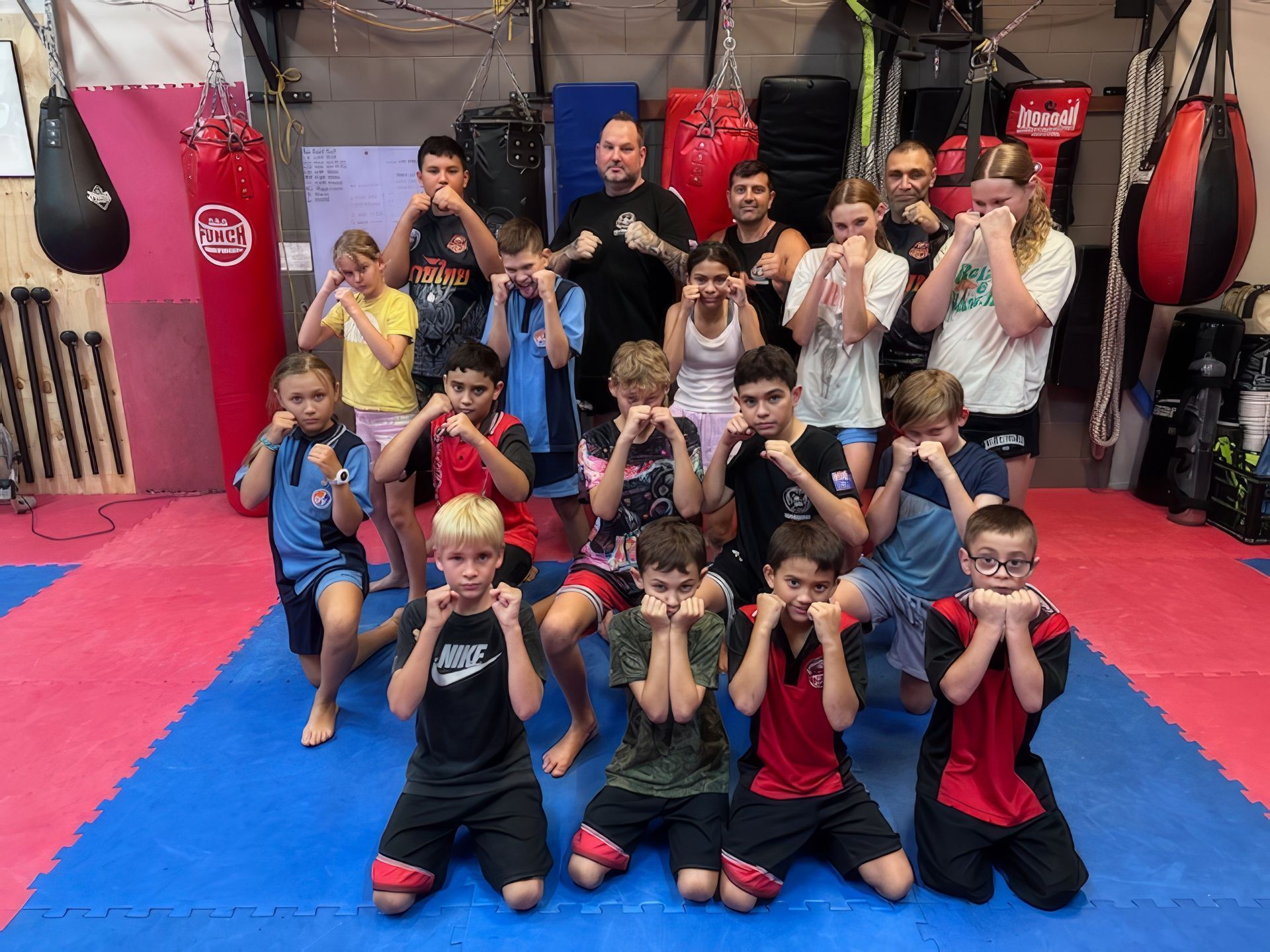 A Group of Young People Are Posing for A Picture in A Gym — Maxenergy Fitness In Smithfield, QLD