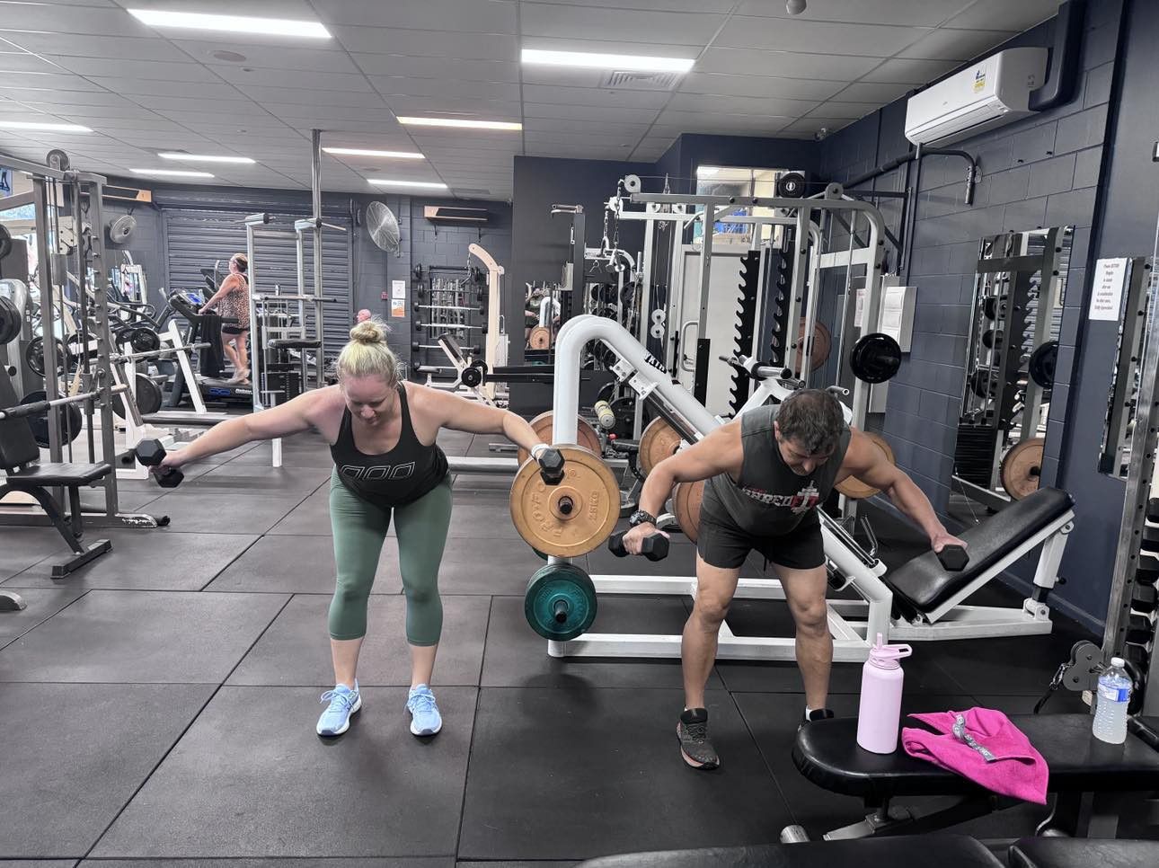 Two People Are Doing Exercises In A Gym — Maxenergy Fitness In Smithfield, QLD