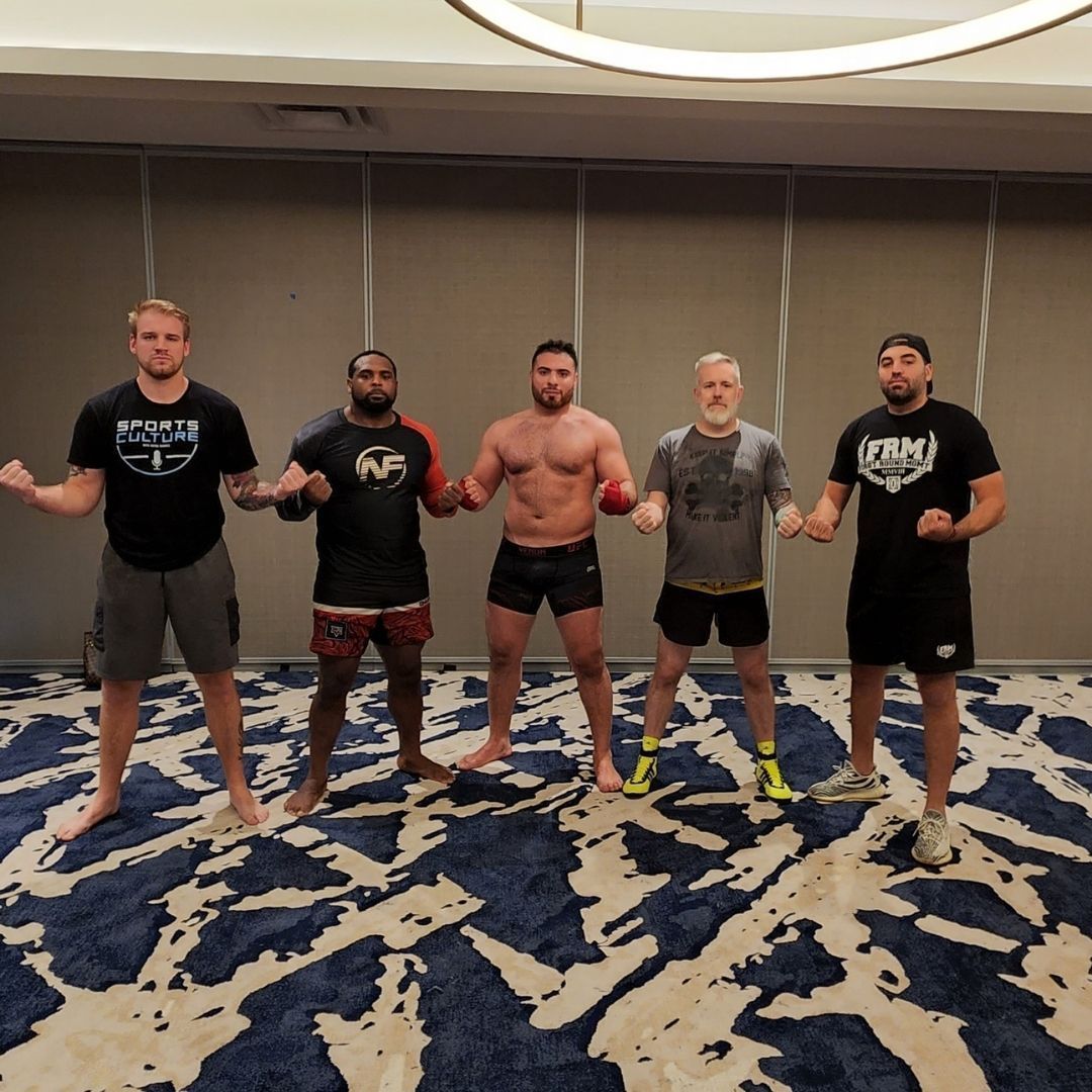 Killer B Combat Academy martial artists training together in a professional academy setting.