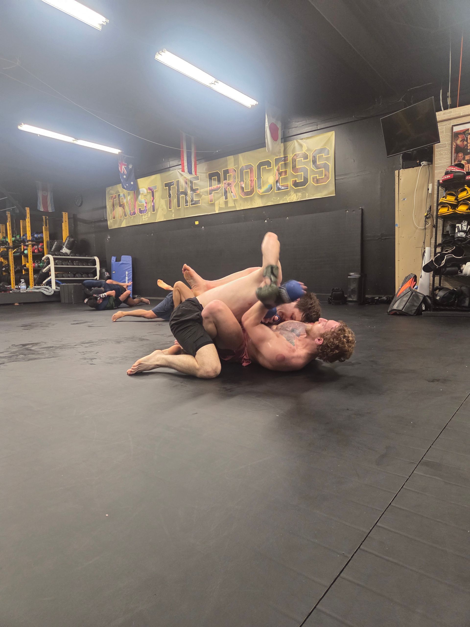 Martial arts students preparing for improved fitness and self-defense skills at Killer B Combat Academy.