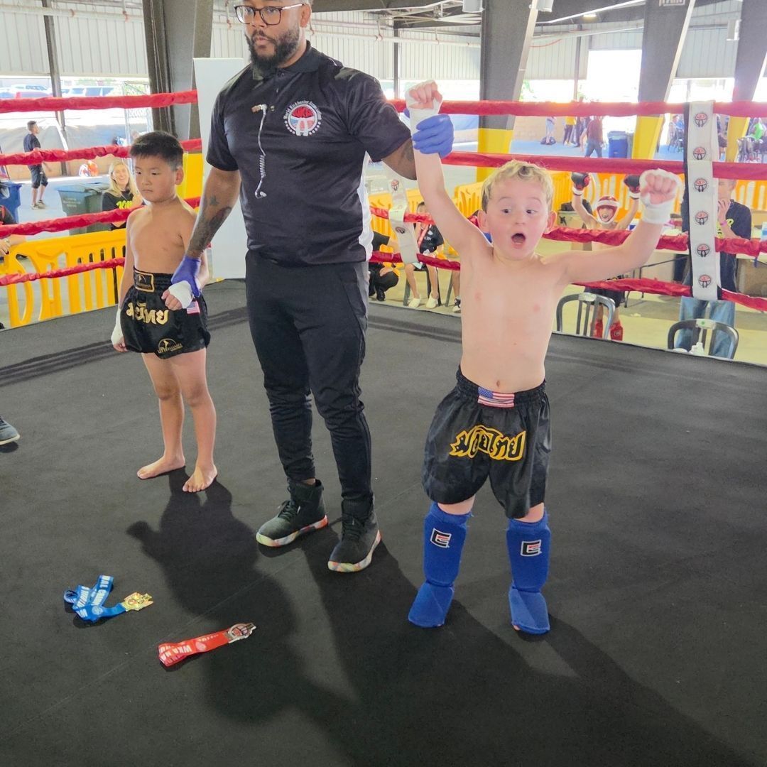 Combat sports training session with students at Killer B Combat Academy.