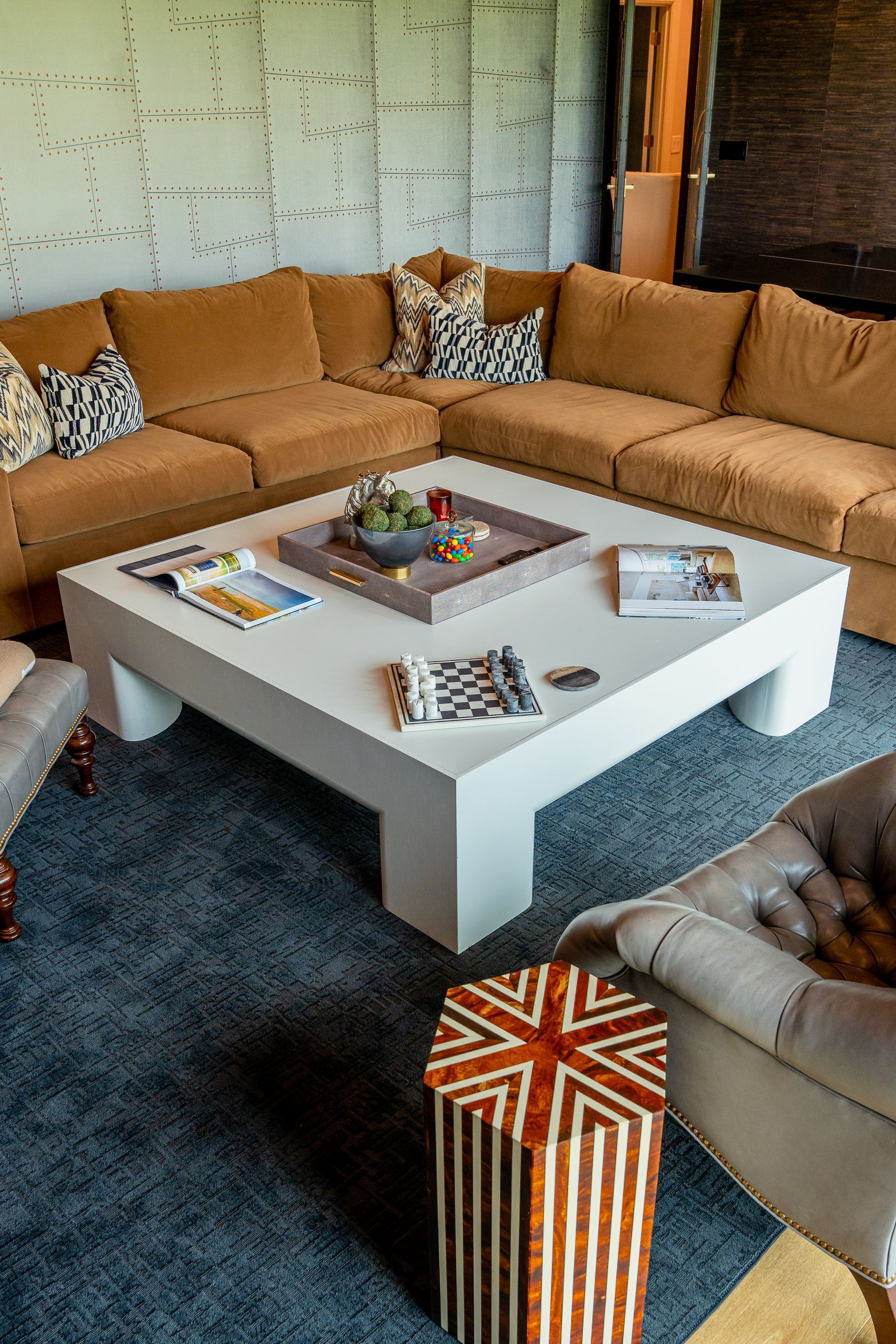 A living room filled with furniture and a coffee table.