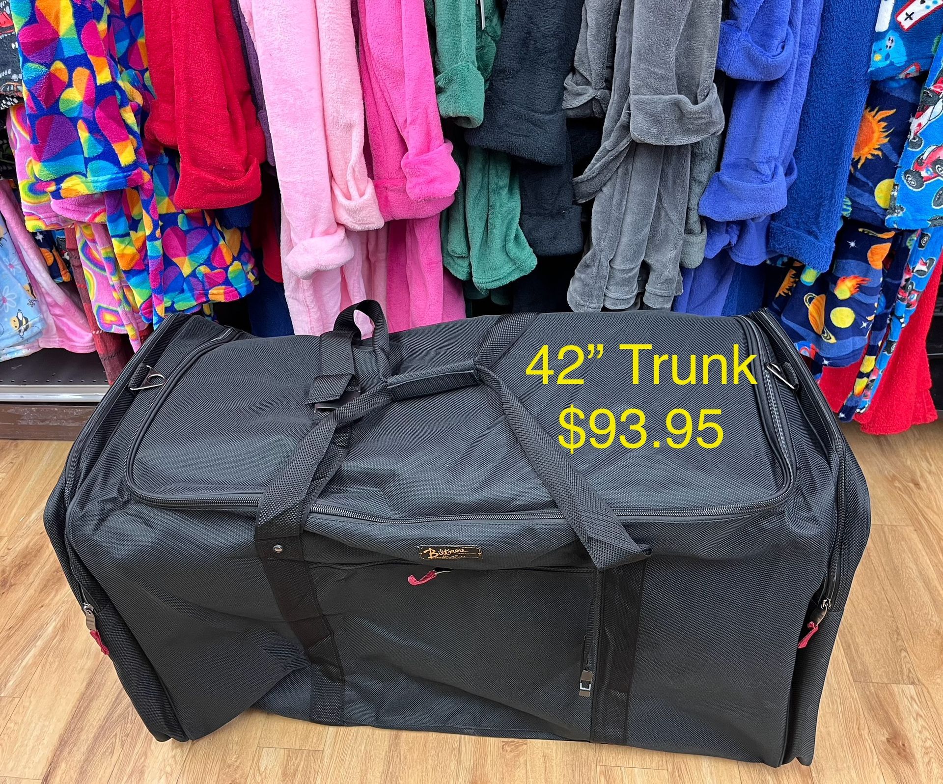 a large black trunk is for sale for 93.95 dollars