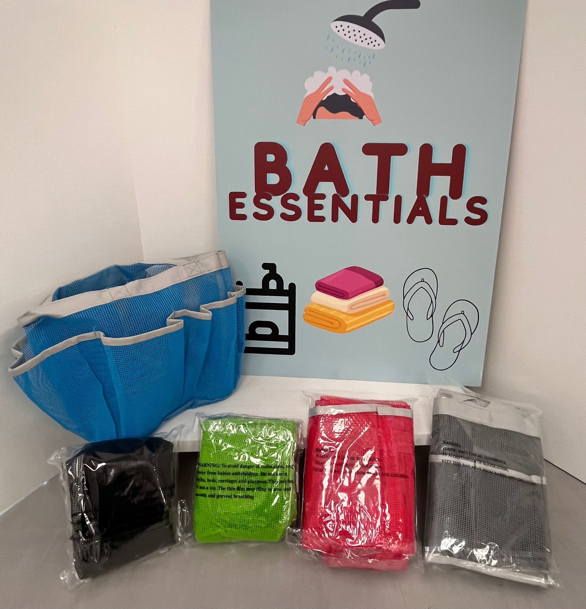 a sign that says bath essentials on it