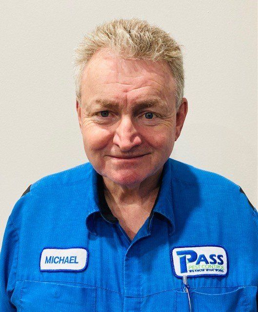Man in a blue uniform with a