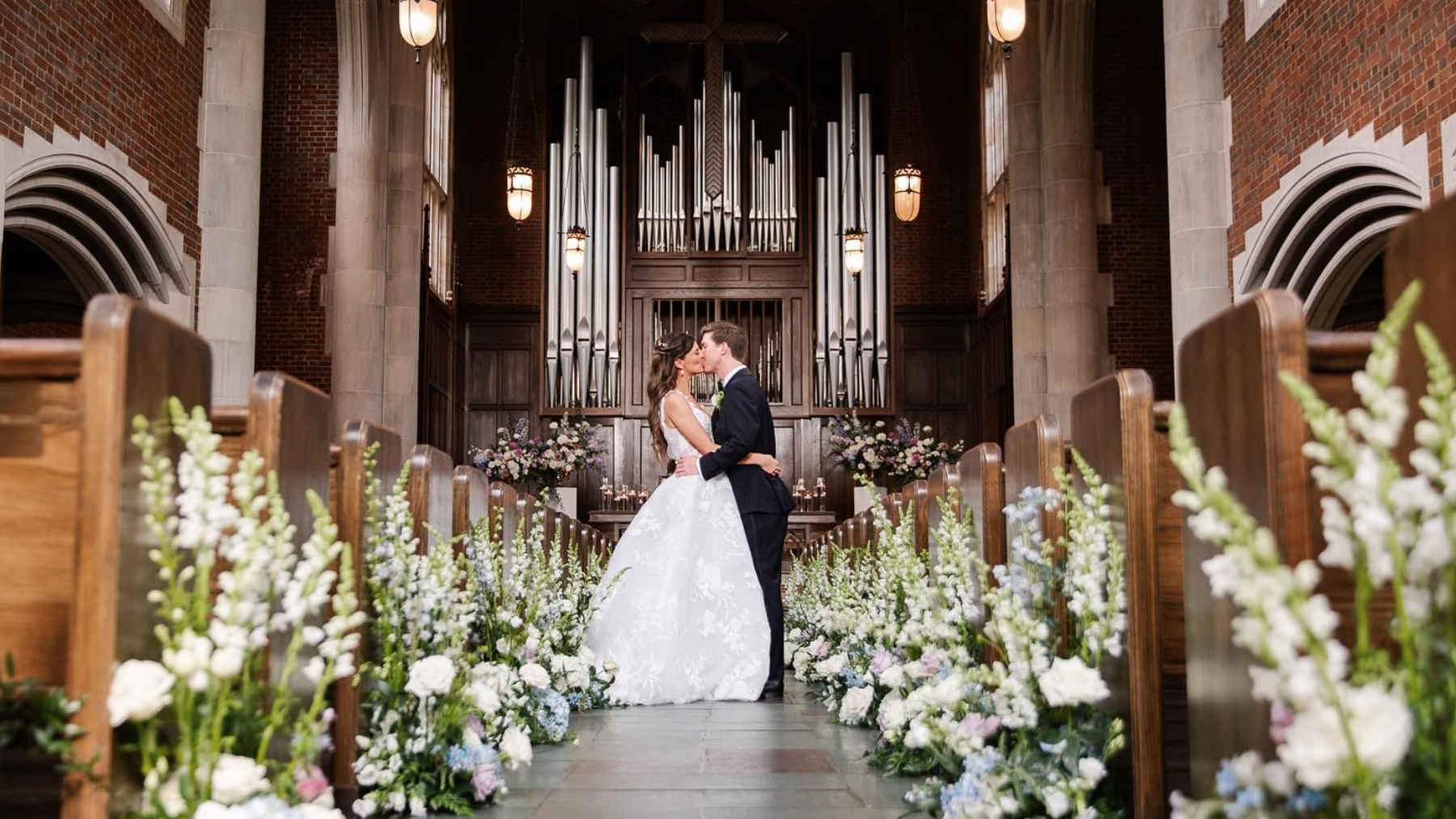 Row of chairs are lined up in front of a tree for a wedding ceremony by Wedding Planner Nashville