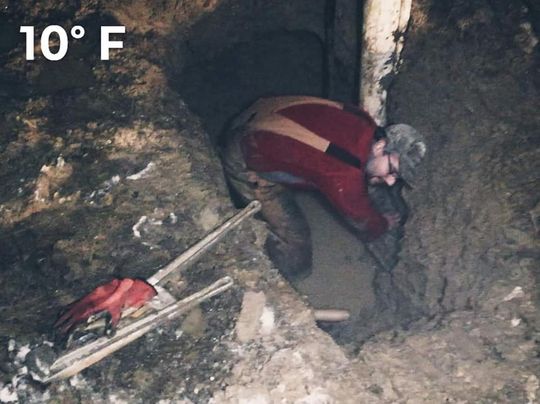 Man Fixing Underground Pipe Leak — Union City, IN — Wiley Water Systems