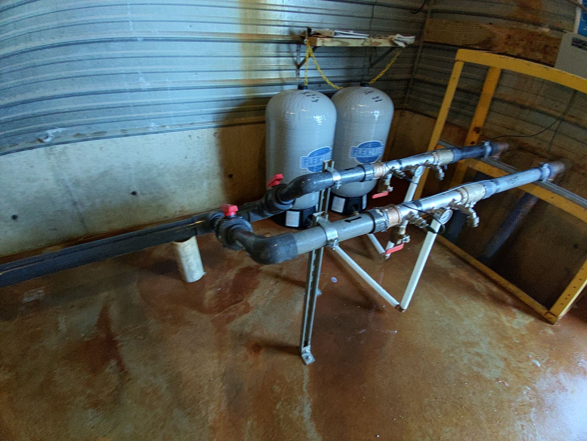 A Room with a Lot of Pipes and Tanks on the Floor — Union City, IN — Wiley Water Systems
