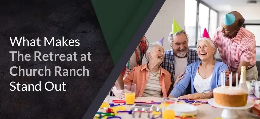 A group of people are sitting at a table with a cake.