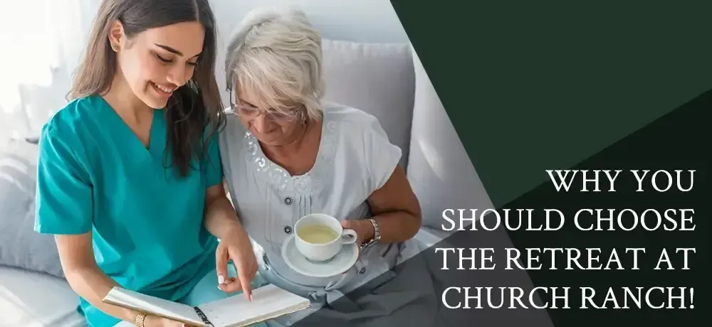 A nurse is reading a book to an elderly woman.
