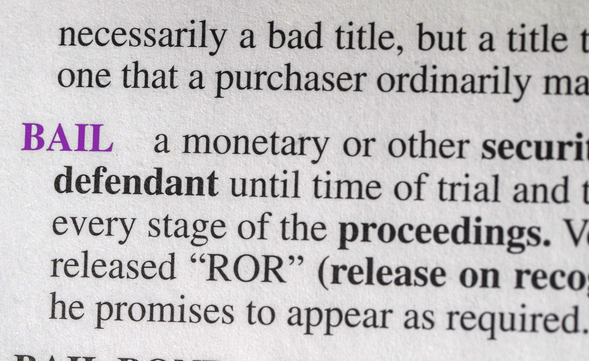 Close-up of a dictionary entry defining bail
