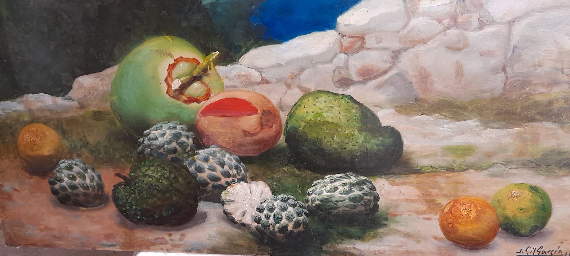 Natura morta di frutta tropicale: cocco, guanabana, arance e altri frutti.