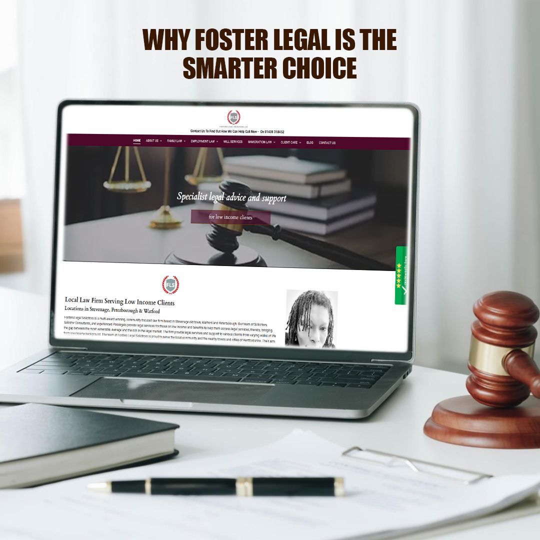 Laptop displaying the Foster Legal website, with a gavel and pen on a desk. The tagline reads,