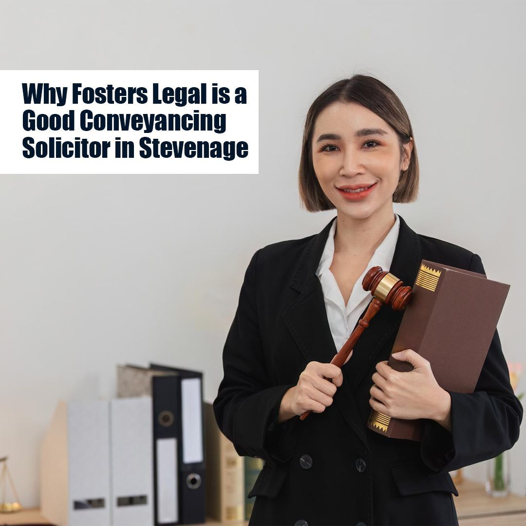 A smiling Asian woman in a suit holding a gavel and a law book. Text: