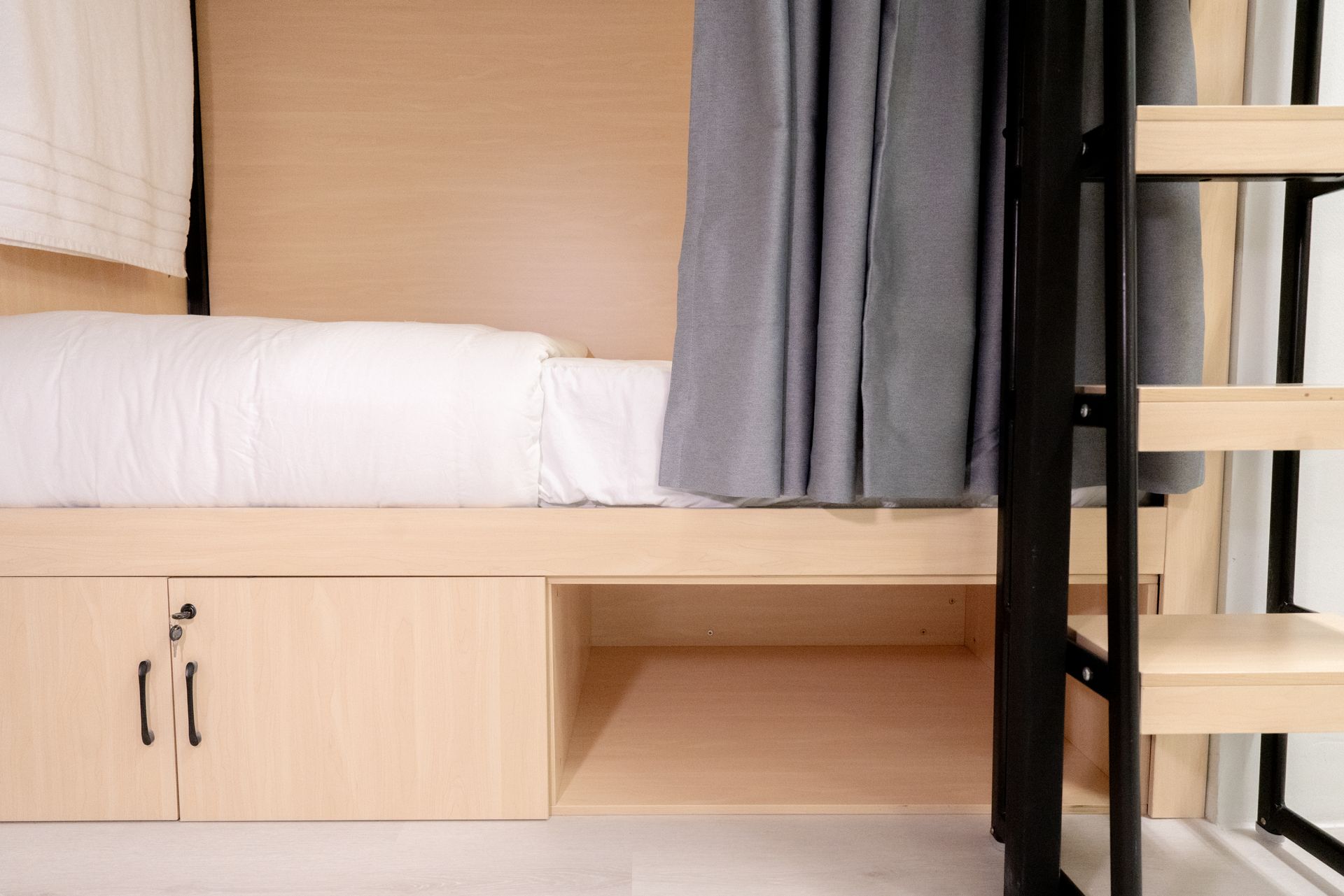 bed with storage locker