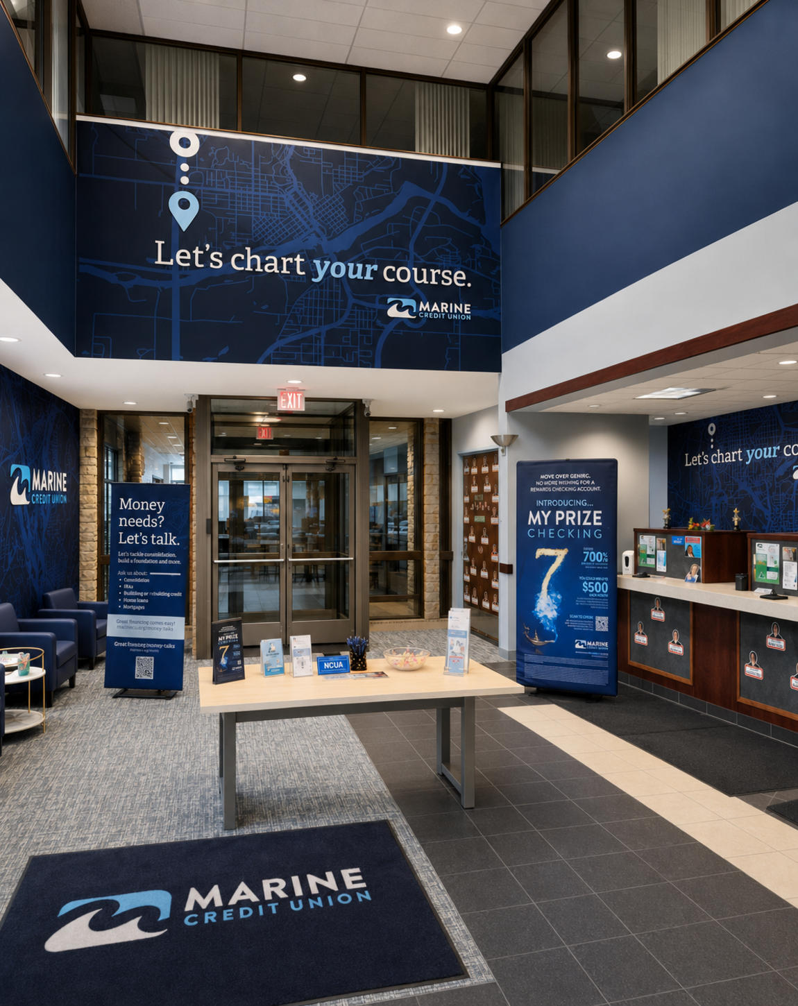 Marine Corps recruiting office lobby with blue walls, brochure table, and entrance doors