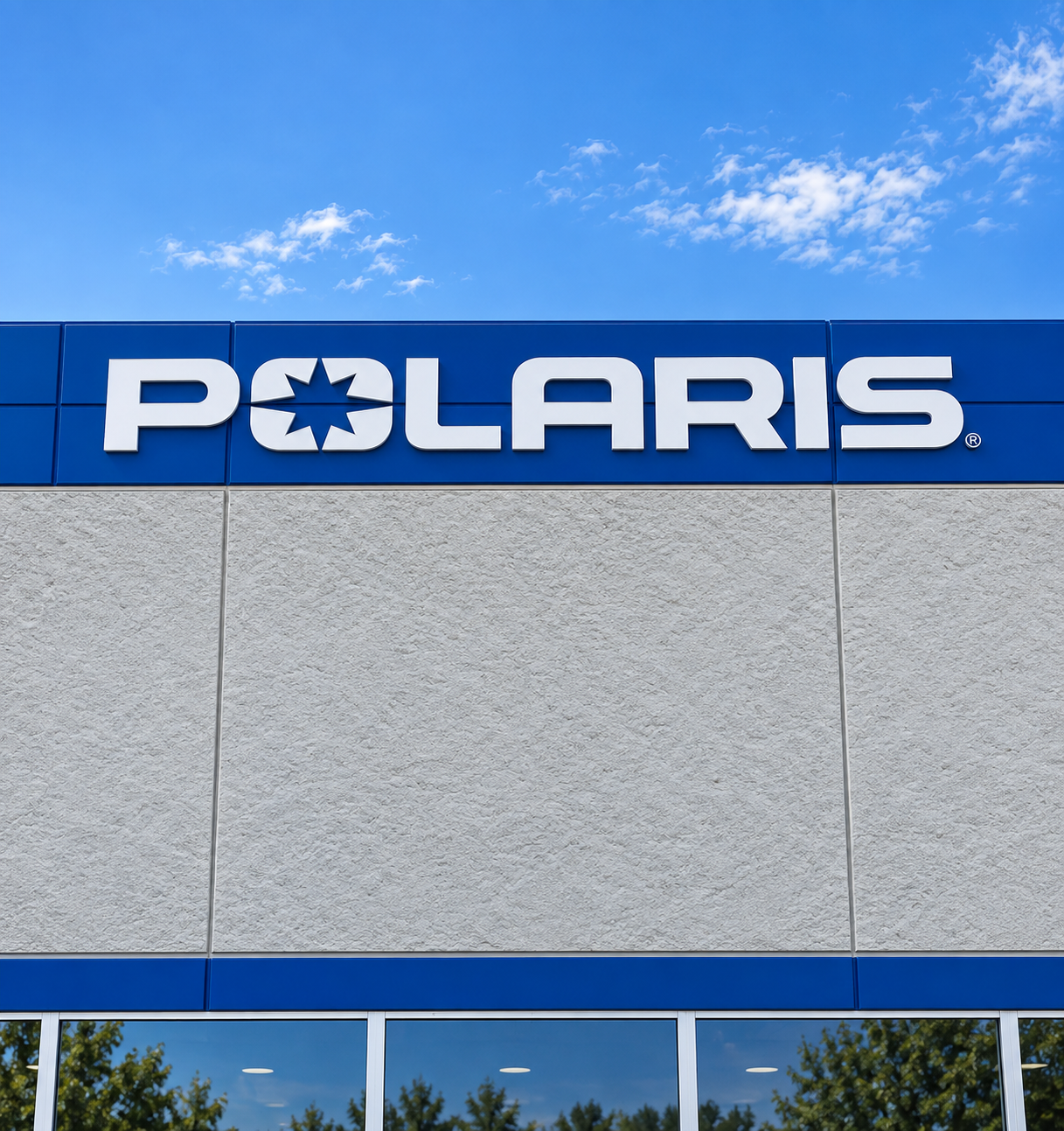 POLARIS sign on a building with a blue sky above