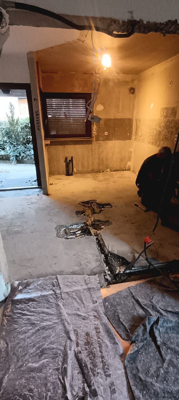 A room that is being remodeled with a lot of tools on the floor.