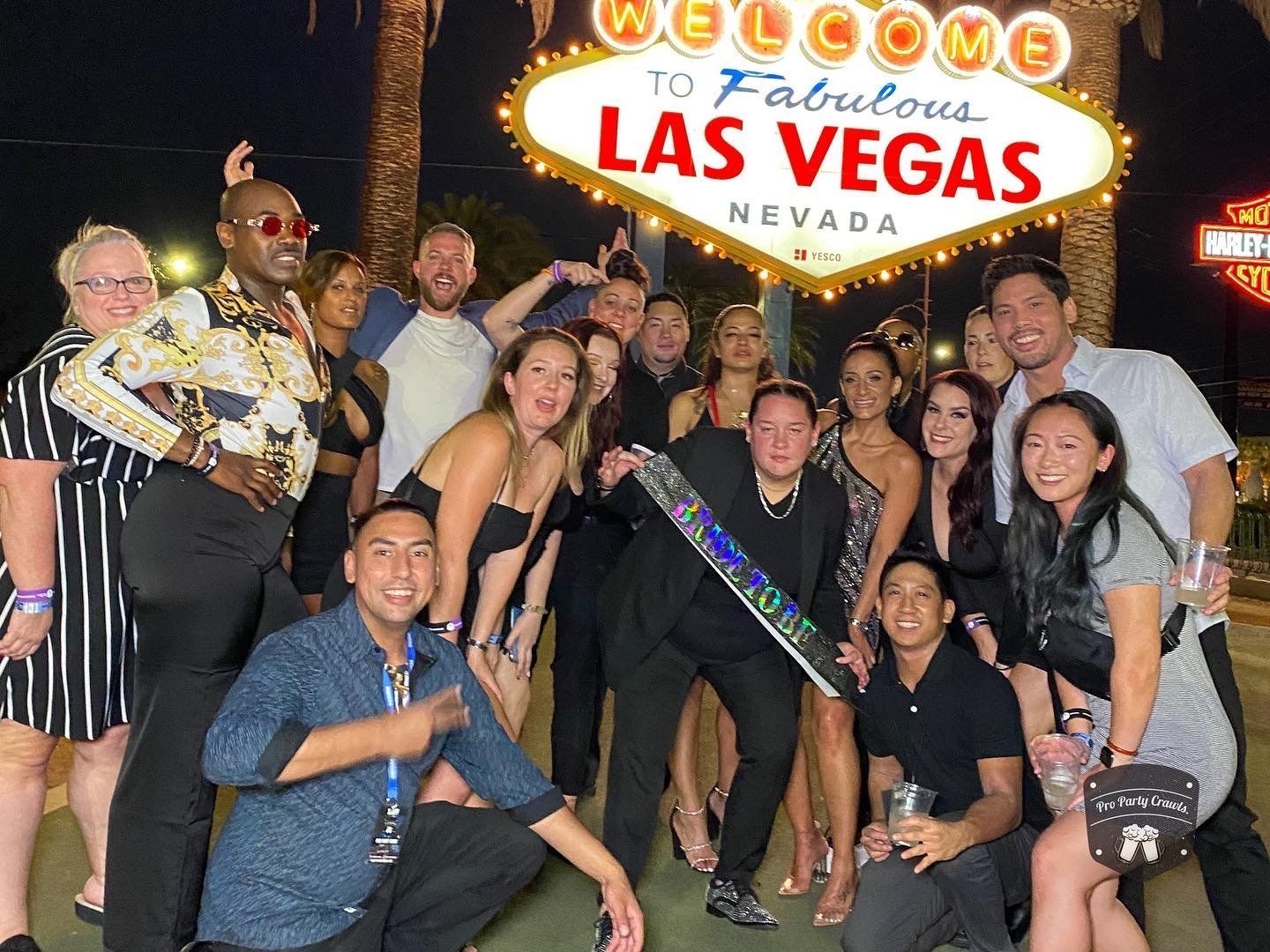 Las Vegas nightclub tour in front of the Fabulous Las Vegas sign. 