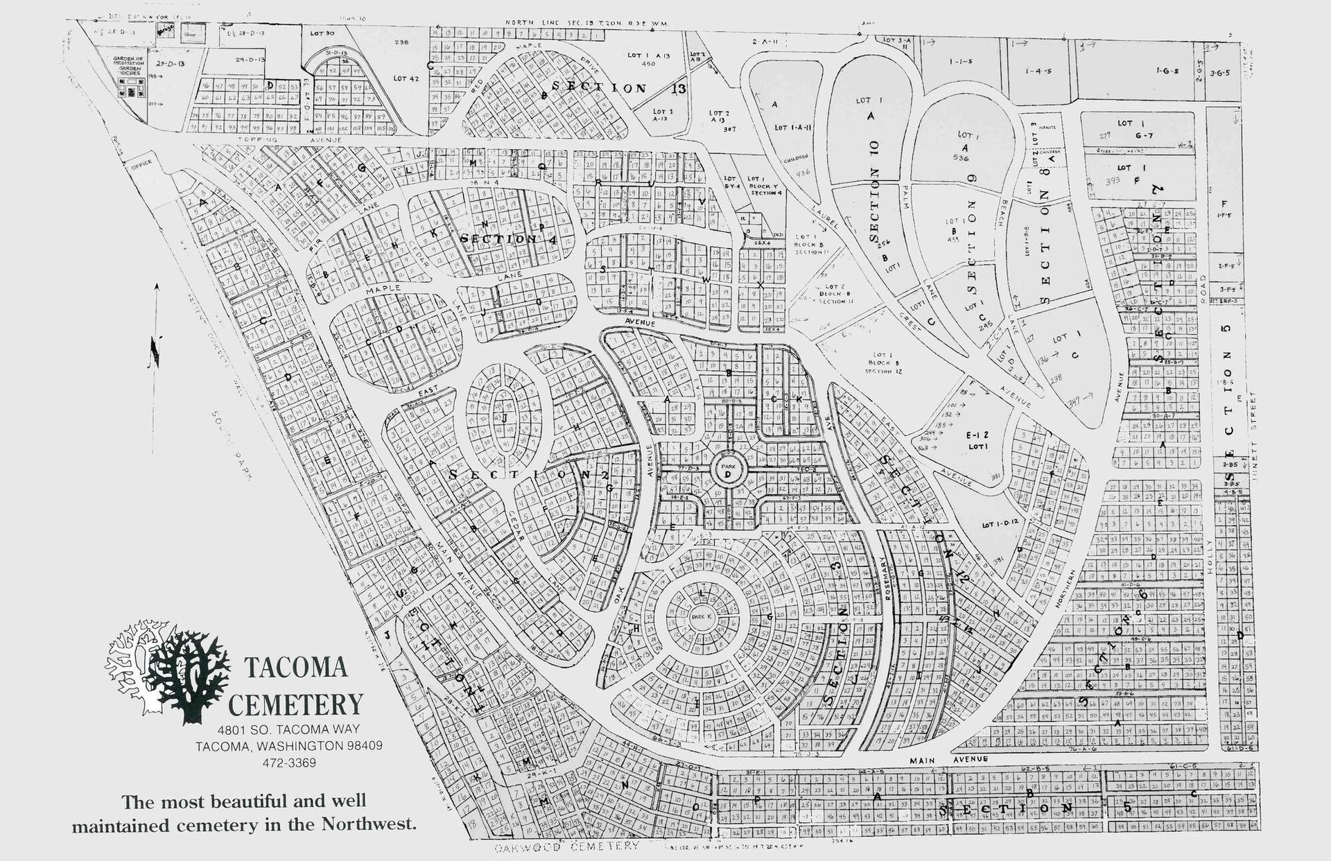 Black-and-white site map of a planned neighborhood with streets, lots, and a logo in the lower left.