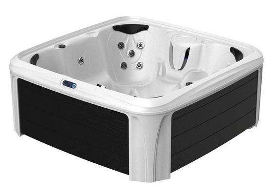 White outdoor hot tub with black side panels and built-in seats, shown on a white background