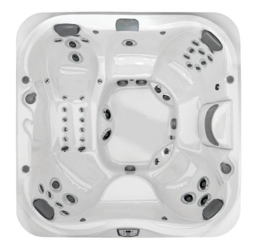 White square hot tub with multiple black jets and molded seats, viewed from above