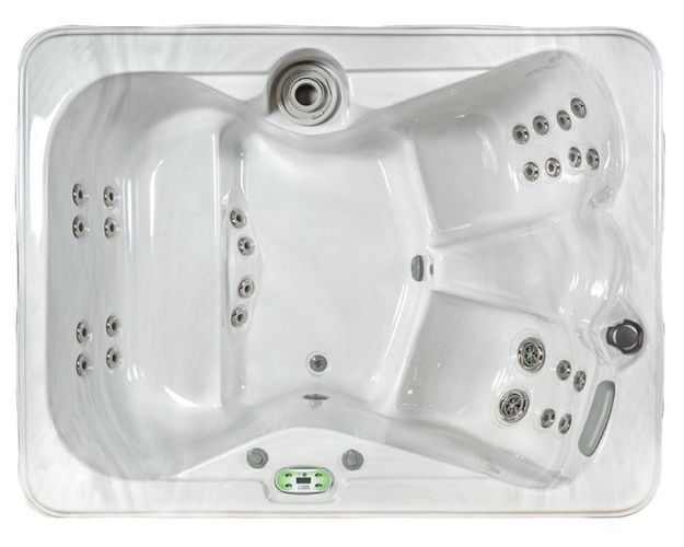 Top-down view of a white rectangular hot tub with multiple jets and seating areas