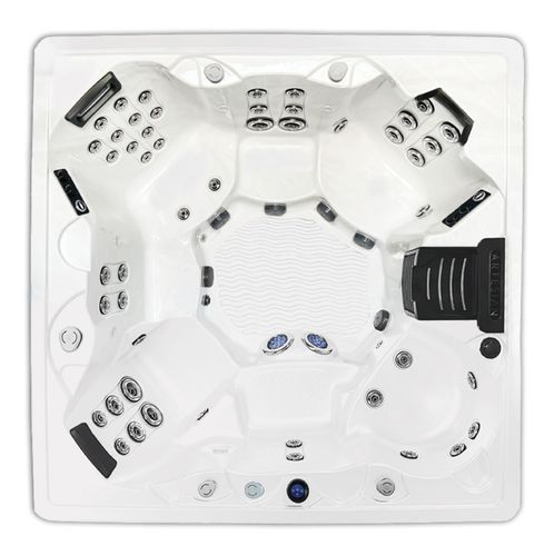 White square hot tub with multiple jets and molded seats, viewed from above