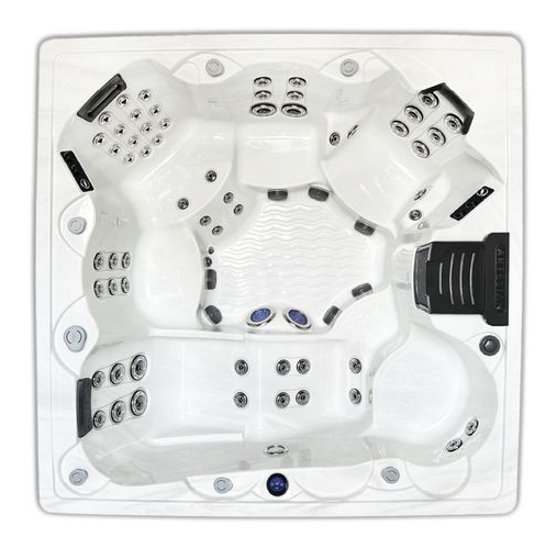 Top-down view of a white multi-seat hot tub with jets and built-in headrests
