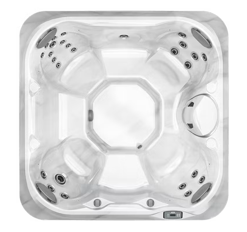 Top-down view of a white hot tub with multiple massage jets and built-in seats
