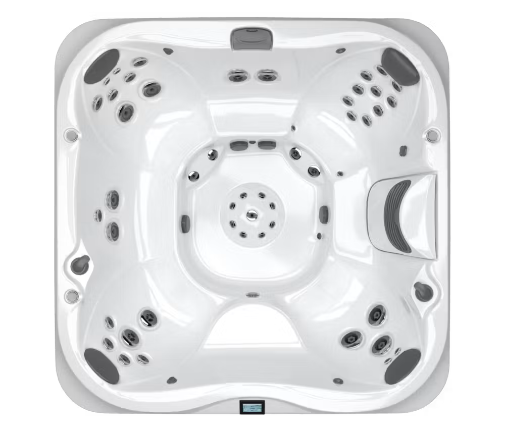 Top-down view of a white hot tub with multiple seats, jets, and headrests