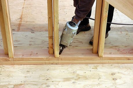 a man is working on a construction project