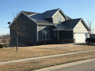 Large House with Black Truck — Oglesby, IL — H & S Contracting Inc.