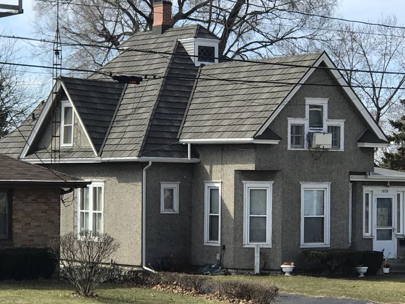 House with Gray Roof — Oglesby, IL — H & S Contracting Inc.