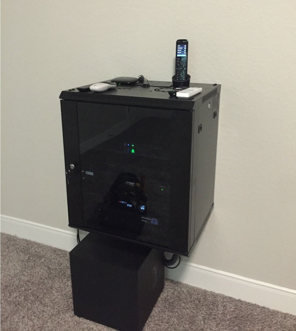 A black box with a phone on top of it