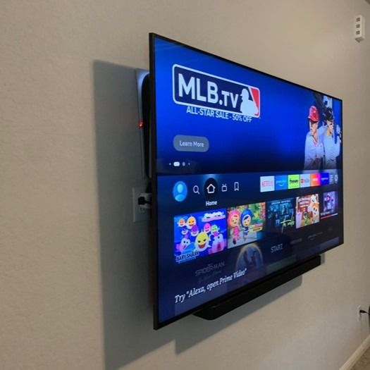 A flat screen tv with mlb.tv on the screen