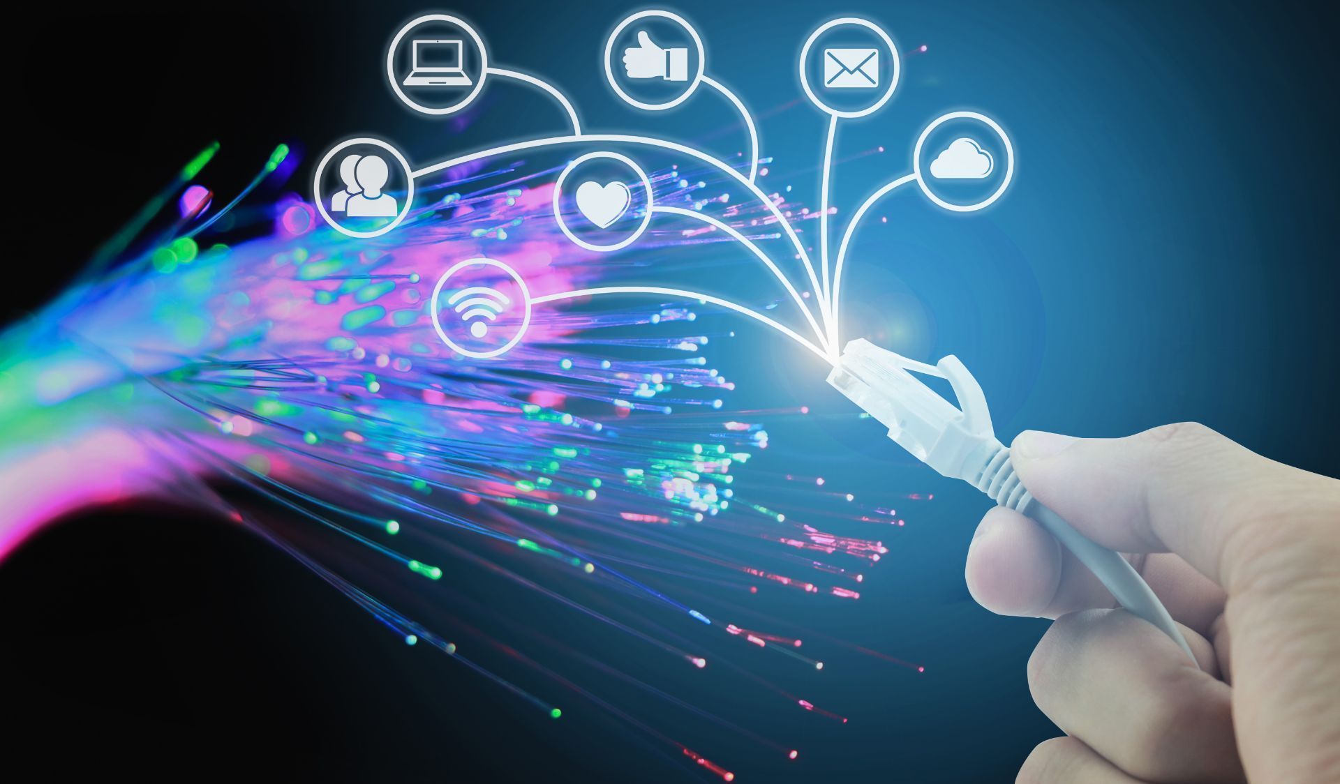 a hand is holding an ethernet cable with a bunch of icons coming out of it .