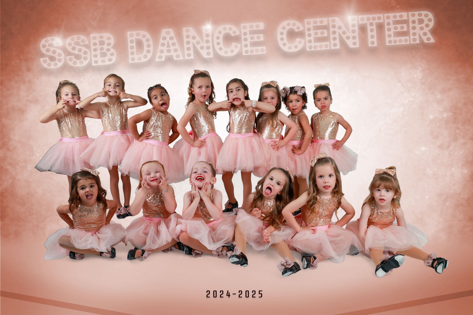 Group of young girls in pink tutus striking playful poses at SSB Dance Center.