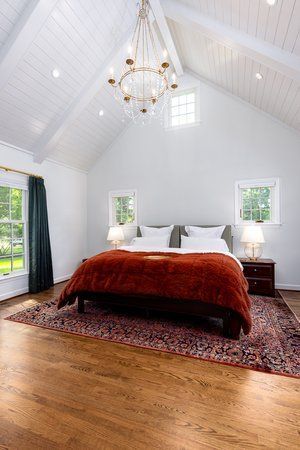 There is a large bed in the middle of the room.