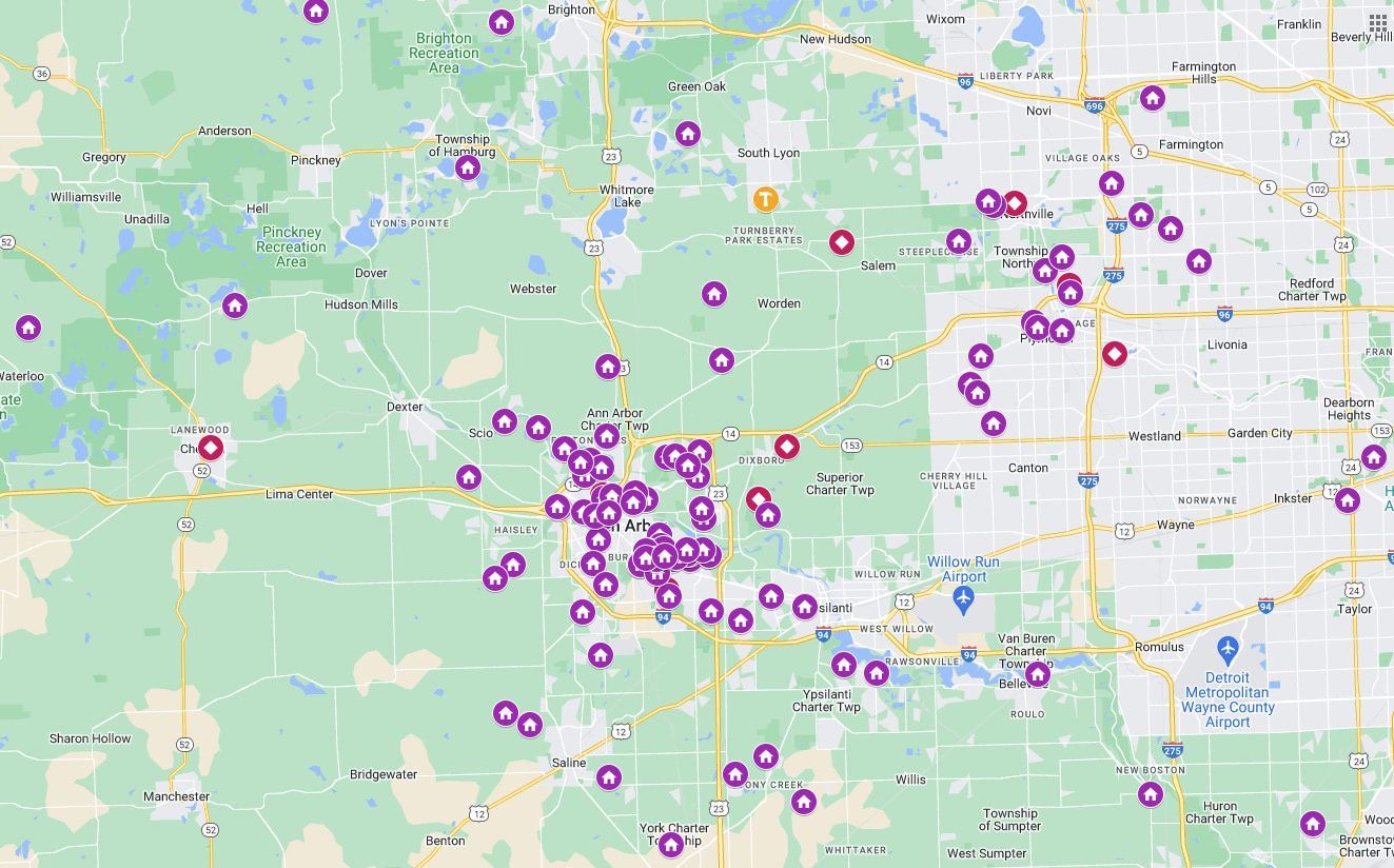 A map of a city with purple dots on it.