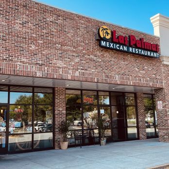 Las Palmas Mexican Restaurant exterior with brick facade, large windows, and signage.