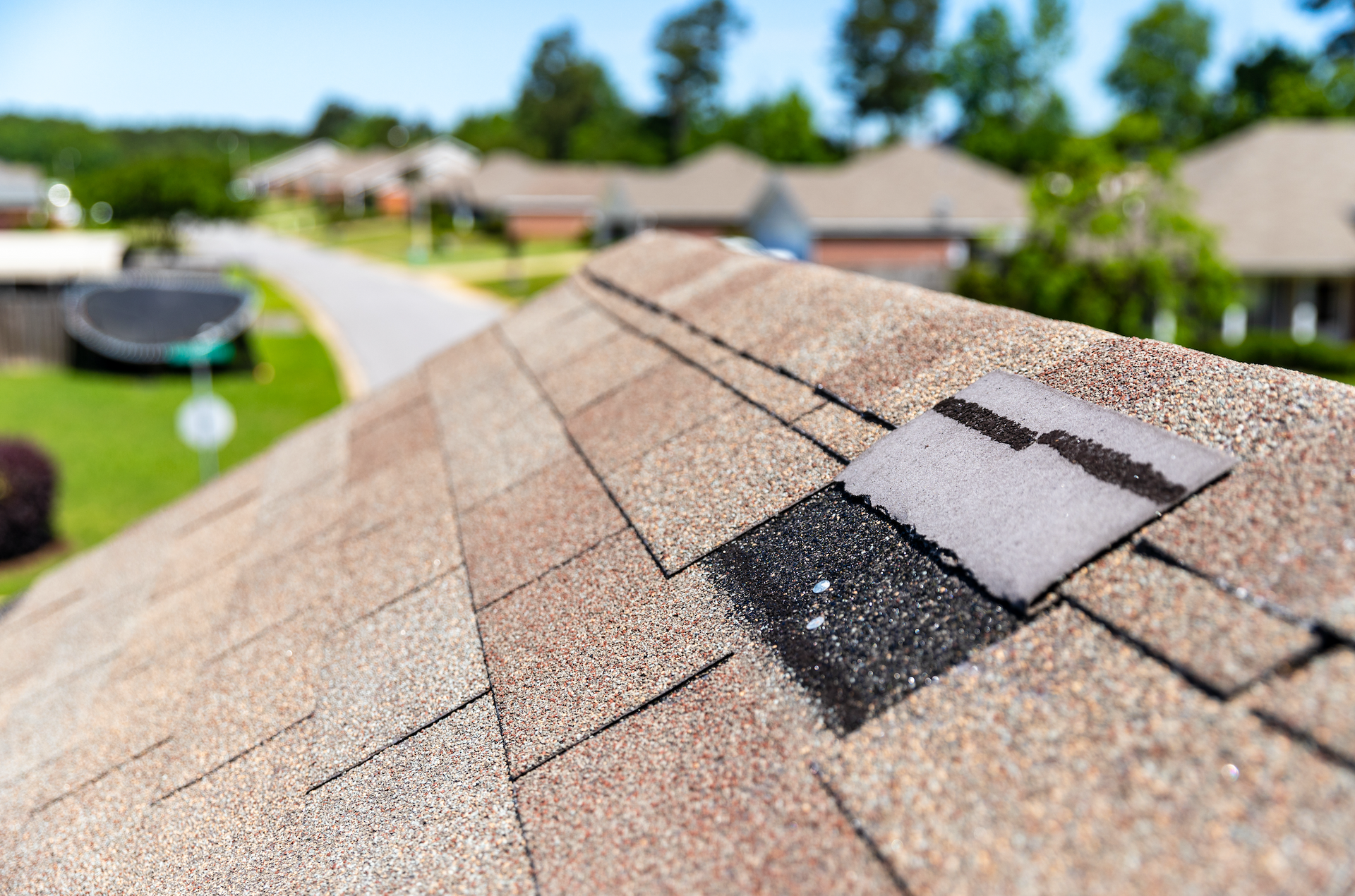 A close up of a roof with a hole in it.